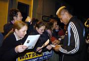 9 November 2005; Jerry Collins, member of the New Zealand All Blacks team, signs autographs during a visit to Ramelton, Co. Donegal, the birthplace of Dave Gallaher as part of centenary celebrations for the Originals tour. Players and New Zealand Rugby Union officials travelled to the village of Ramelton in County Donegal where the Originals' captain was born. Ramelton, Co. Donegal. Picture credit: Pat Murphy / SPORTSFILE