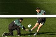 11 November 2005; Ronan O'Gara, Ireland, practices his kicking with the help of Mark Tainton, kicking coach, during the captain's run. Ireland Captain's Run, Lansdowne Road, Dublin. Picture credit: Damien Eagers / SPORTSFILE