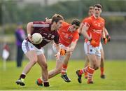 30 March 2014; Gary O'Donnell, Galway, in action against Rory Grugan, Armagh. Allianz Football League Division 2, Round 6, Galway v Armagh, Tuam Stadium, Tuam, Co. Galway. Picture credit: Ray Ryan / SPORTSFILE