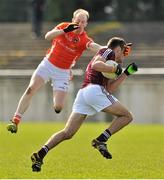 30 March 2014; Gary McCooey, Armagh, in action against Fiontan O Curraoin, Galway. Allianz Football League Division 2, Round 6, Galway v Armagh, Tuam Stadium, Tuam, Co. Galway. Picture credit: Ray Ryan / SPORTSFILE