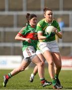 30 March 2014; Louise Galvin, Kerry, in action against Amy Bell, Mayo. TESCO Homegrown Ladies National Football League, Division 1, Round 6, Kerry v Mayo, Fitzgerald Stadium, Killarney, Co. Kerry. Picture credit: Barry Cregg / SPORTSFILE