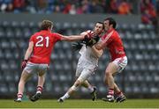 30 March 2014; Ronan McNamee, Tyrone, in action against Andrew O'Sullivan, left, and James Loughrey, Cork. Allianz Football League Division 1, Round 6, Cork v Tyrone, Pairc Ui Rinn, Cork. Picture credit: Ramsey Cardy / SPORTSFILE