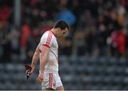 30 March 2014; Tyrone's Kyle Coney leaves the field dejected after the game ended in a draw. Allianz Football League Division 1, Round 6, Cork v Tyrone, Pairc Ui Rinn, Cork. Picture credit: Ramsey Cardy / SPORTSFILE