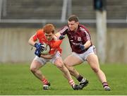 30 March 2014; Kyle Carragher Armagh, in action against Keith Kelly, Galway. Allianz Football League Division 2, Round 6, Galway v Armagh, Tuam Stadium, Tuam, Co. Galway. Picture credit: Ray Ryan / SPORTSFILE