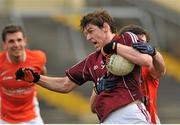 30 March 2014; Thomas Flynn, Galway, in action against Aaron Findon, Armagh. Allianz Football League Division 2, Round 6, Galway v Armagh, Tuam Stadium, Tuam, Co. Galway. Picture credit: Ray Ryan / SPORTSFILE