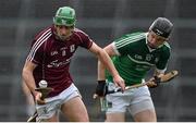 30 March 2014; David Burke, Galway, in action against Kevin Downes, Limerick. Allianz Hurling League Division 1, Quarter-Final, Limerick v Galway, Gaelic Grounds, Limerick. Picture credit: Diarmuid Greene / SPORTSFILE