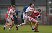 30 March 2014; Fintan Goold, Cork, in action against Colm Cavanagh, Tyrone. Allianz Football League Division 1, Round 6, Cork v Tyrone, Pairc Ui Rinn, Cork. Picture credit: Ramsey Cardy / SPORTSFILE