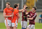 30 March 2014; Tony Kernan and Kieran Toner, left, Armagh, during an altercation with Michael Lundy and Paul Varley, right, Galway. Allianz Football League Division 2, Round 6, Galway v Armagh, Tuam Stadium, Tuam, Co. Galway. Picture credit: Ray Ryan / SPORTSFILE