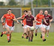 30 March 2014; Fiontan O Curraoin, Galway, in action against Caolan Rafferty, left, and Kieran Toner, Armagh. Allianz Football League Division 2, Round 6, Galway v Armagh, Tuam Stadium, Tuam, Co. Galway. Picture credit: Ray Ryan / SPORTSFILE