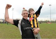 30 March 2014; Kilkenny's Victor Ryan celebrates with his son Gavin, aged three, after the final whistle. The Provincial Towns Cup sponsored by Cleaning Contractors, Semi-Final, Kilkenny v Wicklow, Tullow, Co. Carlow. Picture credit: Matt Browne / SPORTSFILE
