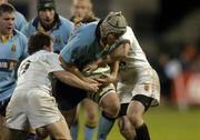 11 November 2005; Keith Doyle, UCD, is tackled by Matt D'Arcy, left, and Conor Donohue, Dublin University. AIB All Ireland League 2005-2006, Division 1, and University Colours Match, UCD v Dublin University, Donnybrook, Dublin. Picture credit: Matt Browne / SPORTSFILE