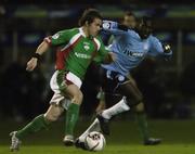 11 November 2005; Joe Gamble, Cork City, in action against Joseph Ndo, Shelbourne. eircom League, Premier Division, Shelbourne v Cork City, Tolka Park, Dublin. Picture credit: David Maher / SPORTSFILE