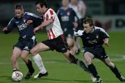 12 November 2005; Ciaran Martyn, Derry City, in action against Stephen Brennan, left, and Stephen Quigley, St. Patrick's Athletic. eircom League, Premier Division, Derry City v St. Patrick's Athletic, Brandywell, Derry. Picture credit: David Maher / SPORTSFILE
