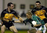 12 November 2005; Graham Geraghty, Leinster, in action against Kevin McGuckin, right, and Enda McNulty, Ulster. M Donnelly Interprovincial Football Championship Final, Leinster v Ulster, Parnell Park, Dublin. Picture credit: Pat Murphy / SPORTSFILE