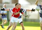 13 November 2005; Darren Bourke, Monaleen, in action against Ger Keane, St. Senans Kilkee. Munster Club Senior Football Championship, Monaleen v St. Senans Kilkee, Gaelic Grounds, Limerick. Picture credit: Kieran Clancy / SPORTSFILE