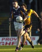 13 November 2005; Ray Cosgrove, Kilmacud Crokes, in action against Thomas O'Connor, St. Peter's. Leinster Club Senior Football Championship Quarter-Final, St. Peter's v Kilmacud Crokes, Pairc Tailteann, Navan, Co. Meath. Picture credit: Damien Eagers / SPORTSFILE