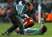 12 November 2005; Shane Horgan, Ireland, is attended to by team doctor Dr Gary O'Driscoll. permanent tsb International Friendly 2005-2006, Ireland v New Zealand, Lansdowne Road, Dublin. Picture credit: Brendan Moran / SPORTSFILE