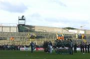 12 November 2005; The Ireland and New Zealand teams lineup before the game for the national anthems in front of an empty North Terrace, which was closed for safety reasons due to a fire the day before the match. permanent tsb International Friendly 2005-2006, Ireland v New Zealand, Lansdowne Road, Dublin. Picture credit: Brendan Moran / SPORTSFILE