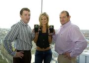 15 November 2005; Former Offaly hurler Brian Whelahan and former Munster rugby player Peter Clohessy, with model Kelly O'Byrne, at the launch of the search for the best Guinness bartender on the island of Ireland. Gravity Bar, Guinness Storehouse, Dublin. Picture credit: Damien Eagers / SPORTSFILE