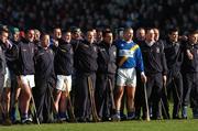 13 November 2005; Players and officials from Loughrea stand together during the National Anthem. Galway County Senior Hurling Championship Final, Portumna v Loughrea, Pearse Stadium, Galway. Picture credit: David Maher / SPORTSFILE