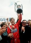 21 April 1991; Dundalk captain Martin Lawlor lifts the Premier Division trophy after the Bord Gais National League Premier Division match between Cork City and Dundalk at Turners Cross in Cork. Photo by David Maher/Sportsfile