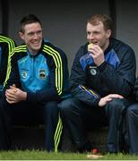30 March 2014; Tipperary's  Michael Cahill, left, and Lar Corbett in the dugout before the start of the game. Allianz Hurling League Division 1, Quarter-Final, Tipperary v Cork, Semple Stadium, Thurles, Tipperary. Picture credit: David Maher / SPORTSFILE