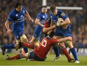 29 March 2014; Jamie Heaslip, Leinster, is tackled by Ian Keatley and Dave Foley, Munster. Celtic League 2013/14, Round 18, Leinster v Munster, Aviva Stadium, Lansdowne Road, Dublin. Picture credit: Brendan Moran / SPORTSFILE