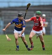 30 March 2014; Conor O'Brien, Tipperary, in action against Seamus Harnedy, Cork. Allianz Hurling League Division 1, Quarter-Final, Tipperary v Cork, Semple Stadium, Thurles, Tipperary. Picture credit: David Maher / SPORTSFILE