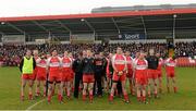 30 March 2014; The Derry squad stand for a minutes silence. Allianz Football League Division 1, Round 6, Derry v Kildare, Celtic Park, Derry. Picture credit: Oliver McVeigh / SPORTSFILE