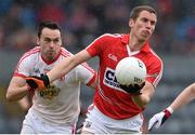 30 March 2014; Paddy Kelly, Cork, in action against Kyle Coney, Tyrone. Allianz Football League Division 1, Round 6, Cork v Tyrone, Pairc Ui Rinn, Cork. Picture credit: Ramsey Cardy / SPORTSFILE