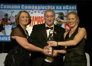 12 November 2005; Jovita Delaney, from Tipperary, who was presented with her award by Ossie Kilkenny, Chairperson, of the Irish Sports Council and Miriam O'Callaghan, left, President, Cumann Camogaiochta na nGael, at the 2005 Camogie All-Star Awards, in association with O'Neill. Citywest Hotel, Dublin. Picture credit: Brendan Moran / SPORTSFILE