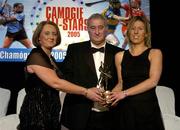 12 November 2005; Sinead Cahalan, from Galway, who was presented with her award by Ossie Kilkenny, Chairperson, of the Irish Sports Council and Miriam O'Callaghan, left, President, Cumann Camogaiochta na nGael, at the 2005 Camogie All-Star Awards, in association with O'Neills. Citywest Hotel, Dublin. Picture credit: Brendan Moran / SPORTSFILE