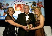 12 November 2005; Julie Kirwan, from Tipperary, who was presented with her award by Ossie Kilkenny, Chairperson, of the Irish Sports Council and Miriam O'Callaghan, left, President, Cumann Camogaiochta na nGael, at the 2005 Camogie All-Star Awards, in association with O'Neills, . Citywest Hotel, Dublin. Picture credit: Brendan Moran / SPORTSFILE