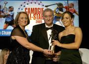 12 November 2005; Anna Geary, from Cork, who was presented with her award by Ossie Kilkenny, Chairperson, of the Irish Sports Council and Miriam O'Callaghan, left, President, Cumann Camogaiochta na nGael, at the 2005 Camogie All-Star Awards, in association with O'Neills. Citywest Hotel, Dublin. Picture credit: Brendan Moran / SPORTSFILE