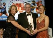 12 November 2005; Mary O'Connor, from Cork, who was presented with her award by Ossie Kilkenny, Chairperson, of the Irish Sports Council and Miriam O'Callaghan, left, President, Cumann Camogaiochta na nGael, at the 2005 Camogie All-Star Awards, in association with O'Neills. Citywest Hotel, Dublin. Picture credit: Brendan Moran / SPORTSFILE