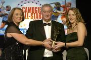 12 November 2005; Therese Maher, from Galway, who was presented with her award by Ossie Kilkenny, Chairperson, of the Irish Sports Council and Miriam O'Callaghan, left, President, Cumann Camogaiochta na nGael, at the 2005 Camogie All-Star Awards, in association with O'Neills. Citywest Hotel, Dublin. Picture credit: Brendan Moran / SPORTSFILE