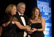 12 November 2005; Therese Maher, from Galway, who was presented with her award by Ossie Kilkenny, Chairperson, of the Irish Sports Council and Miriam O'Callaghan, left, President, Cumann Camogaiochta na nGael, at the 2005 Camogie All-Star Awards, in association with O'Neills. Citywest Hotel, Dublin. Picture credit: Ray McManus / SPORTSFILE