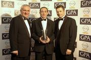 11 November 2005; Tyrone's Brian Dooher, An Taoiseach, Bertie Ahern, T.D, and Dessie Farrell, Chief Executive of the GPA at the 2005 GPA Opel Awards. Citywest Hotel, Dublin. Picture credit: Damien Eagers / SPORTSFILE
