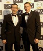 11 November 2005; Cork players John Gardiner, GPA Opel Award Hurler of the Year with goalkeeper Donal Og Cusack at the 2005 GPA Opel Awards. Citywest Hotel, Dublin. Picture credit: Damien Eagers / SPORTSFILE