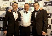 11 November 2005; Cork players John Gardiner, right, GPA Opel Award Hurler of the Year with goalkeeper Donal Og Cusack and Cork manager John Allen at the 2005 GPA Opel Awards. Citywest Hotel, Dublin. Picture credit: Damien Eagers / SPORTSFILE