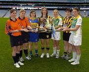 15 November 2005; Camogie players, from left to right, Catriona Kelly and Linda Gohery, Davitts, Marie O'Looney, Newmarket-on-Fergus, Margaret Kavanagh, St. Lachtain's Freshford, Mairin McAleenan, Liatroim Fontenoys, Sinead Costello, St. Lachtain's Freshford, and Lisa McCrickard, Liatroim Fontenoys, at a photocall ahead of the All-Ireland camogie Senior and Junior club championship finals which will take place this Sunday, November 20th. St. Lachtain's and Davitts will contest the Senior final while Liatroim Fontenoys and Newmarket-on-Fergus will contest the Junior final. Croke Park, Dublin. Picture credit: Brian Lawless / SPORTSFILE