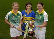 15 November 2005; Junior camogie players, Mairin McAleenan, left, and Lisa McCrickard, right, Liatroim Fontenoys, and Marie O'Looney, Newmarket-on-Fergus, at a photocall ahead of the All-Ireland camogie Senior and Junior club championship finals which will take place this Sunday, November 20th. St. Lachtain's and Davitts will contest the Senior final while Liatroim Fontenoys and Newmarket-on-Fergus will contest the Junior final. Croke Park, Dublin. Picture credit: Brian Lawless / SPORTSFILE