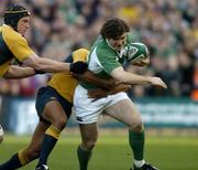 19 November 2005; Gordon D'Arcy, Ireland, is tackled by George Gregan and John Roe, left, Australia. permanent tsb International Friendly 2005-2006, Ireland v Australia, Lansdowne Road, Dublin. Picture credit: Matt Browne / SPORTSFILE