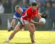 19 November 2005; Brian Geary, Monaleen, in action against Derek De Loughery, St. Senans Kilkee. Munster Club Senior Football Championship Quarter-Final Replay, St. Senans Kilkee v Monaleen, Cooraclare, Clare. Picture credit: Kieran Clancy / SPORTSFILE