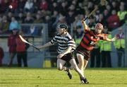 20 November 2005; Seanie Moloney, Clarecastle, in action against Niall O'Donnell, Ballygunner. Munster Club Senior Hurling Championship Semi-Final, Ballgunner v Clarecastle, Walsh Park, Waterford. Picture credit: Matt Browne / SPORTSFILE