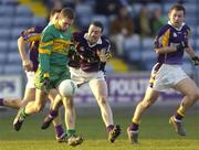 20 November 2005; Shane Sullivan, Rhode, in action against Ray Cosgrave, Kilmacud Crokes. Leinster Club Senior Football Championship Semi-Final, Kilmacud Crokes v Rhode, O'Moore Park, Portlaoise, Co. Laois. Picture credit: Brian Lawless / SPORTSFILE
