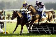 20 November 2005; Eventual winner Brave Inca, left, with Tony McCoy up, ahead of Essex with Ruby Walsh, on their way to winning the Maplewood Developments Morgiana Hurdle. Punchestown Racecourse, Co. Kildare. Picture credit: SPORTSFILE