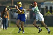 20 November 2005; Jane O'Leary, Newmarket on Fergus, Co. Clare, in action against Grainne O' Higgins, Leitrim Fontenoys, Co. Down, All Ireland Junior Camogie Club Championship Final, Leitrim Fontenoys v Newmarket on Fergus, McDonagh Park, Cloughjordan, Co. Tipperary. Picture credit: Ray McManus / SPORTSFILE