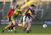 20 November 2005; Brian McGrath, Kilmacud Crokes, in action against Roy Malone, Rhode. Leinster Club Senior Football Championship Semi-Final, Kilmacud Crokes v Rhode, O'Moore Park, Portlaoise, Co. Laois. Picture credit: Brian Lawless / SPORTSFILE