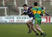 20 November 2005; Brian McGrath, Kilmacud Crokes, in action against Eoin Byrne, Rhode. Leinster Club Senior Football Championship Semi-Final, Kilmacud Crokes v Rhode, O'Moore Park, Portlaoise, Co. Laois. Picture credit: Brian Lawless / SPORTSFILE